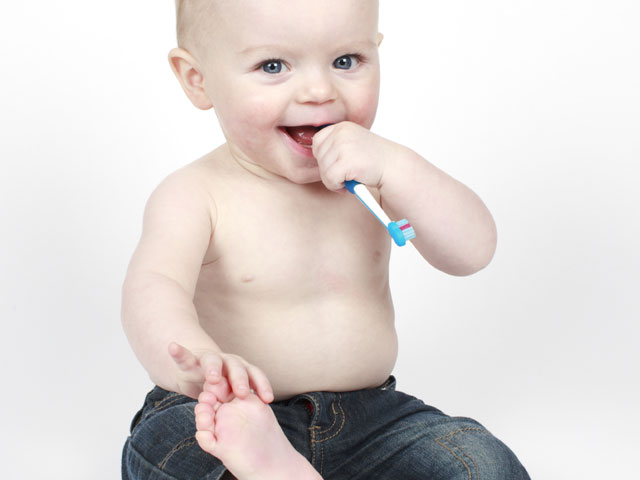 CHILD’S FIRST DENTAL APPOINTMENT