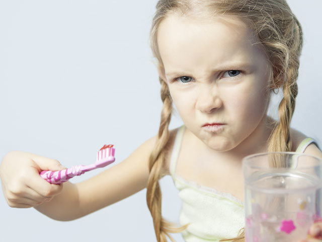 SIGNS YOUR CHILD ISN’T BRUSHING THEIR TEETH