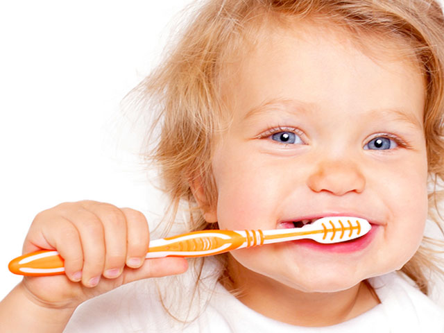 baby brushing teeth, dr. dennis dunne, DDS