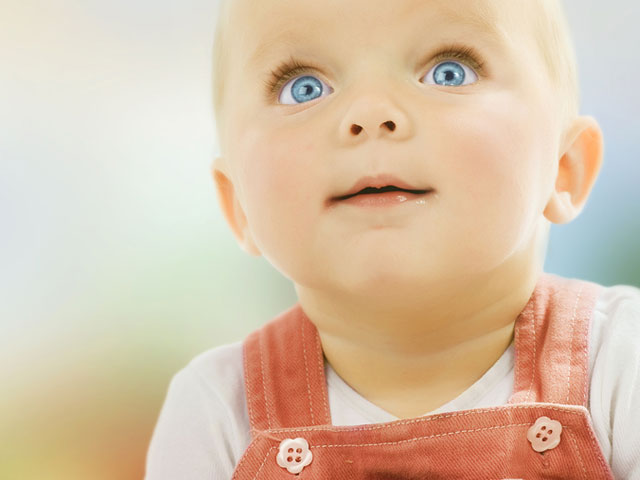 dr-dennis-dunne-baby-looking-up-blue-eyes