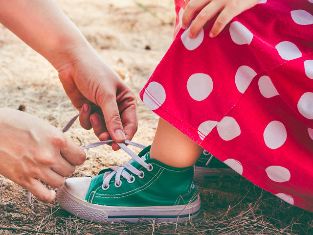 CAN SHE TIE HER SHOES?