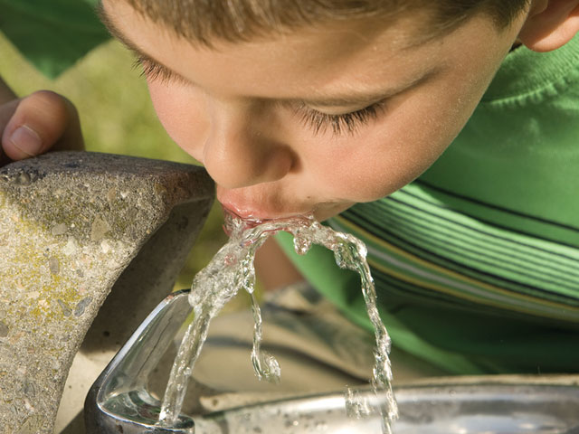 dr-dennis-dunne-boy-drinking-from-fountain