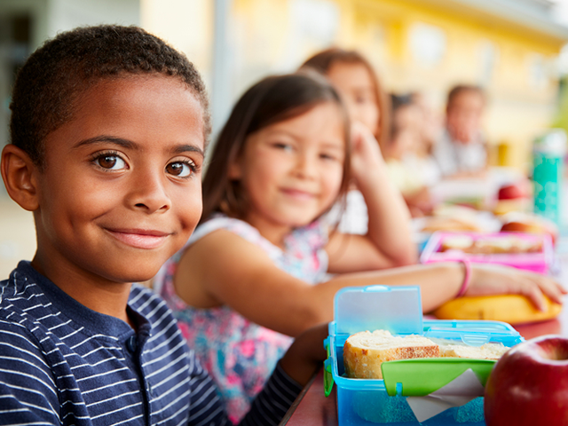 dr.-dennis-dunne-black-boy-at-school-dental-sealants