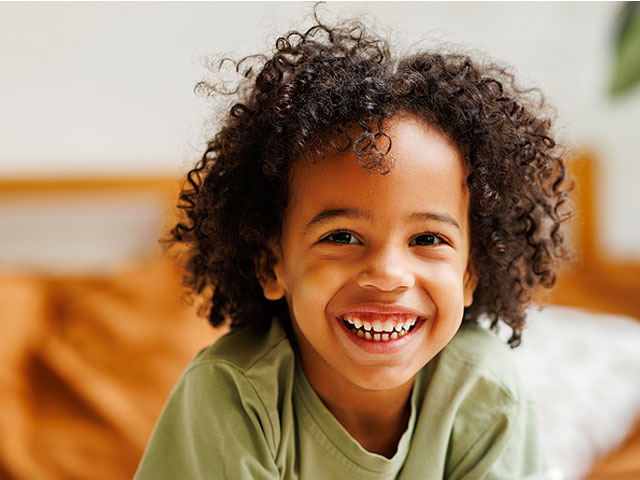 black-african-american-boy-smiling-dennis-dunne-childrens-dentist-eugene-oregon
